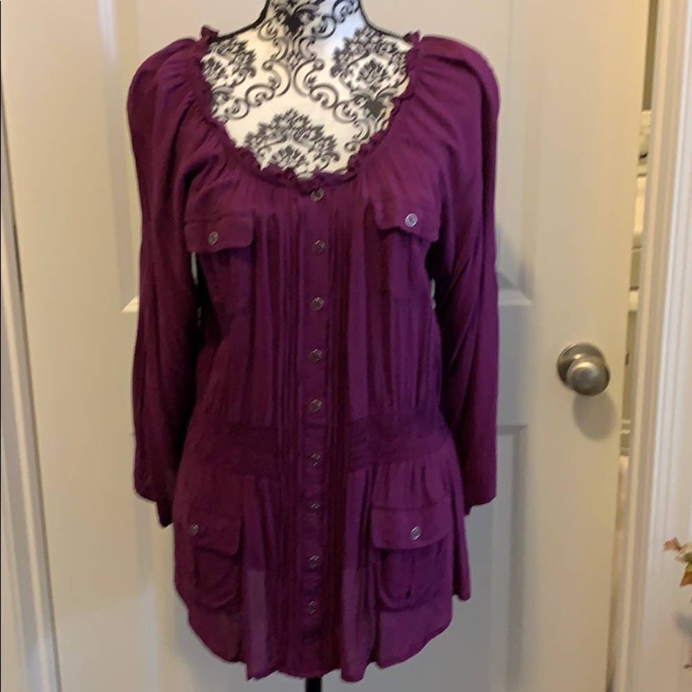 Woman’s long sleeve blouse with rounded neckline